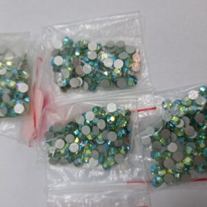 SWAROVSKI  SS20 PERIDOT AB  ( наявність 4 гросс) ціна за 1грос 144каменця